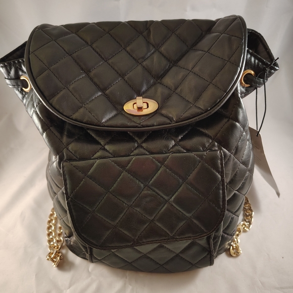 Ariana Grande Handbags - Ariana Grande Black Quilted Backpack with Gold Accents
